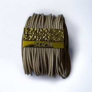 SAACHI • beige leather cord magnetic clasp cuff bracelet